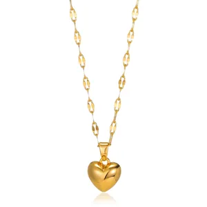 Detailed view showing 10mm gold heart pendant size and adjustable 38+7cm chain length
