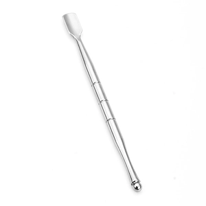Close-up of dual-head stainless steel tool with flat scraper and ball tip for nail care