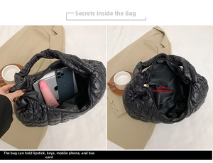 Detail view of the black quilted crossbody bag internal main pocket showing large capacity