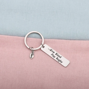 Stainless steel rugby keychain with Give Blood Play Rugby engraved metal rectangular tag