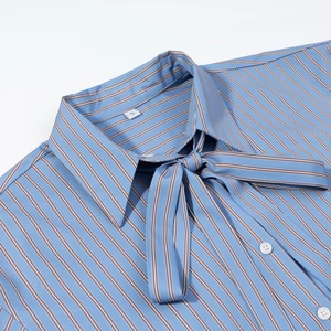 Women's blue striped shirt with bow-knot neckline design in a minimalist casual style