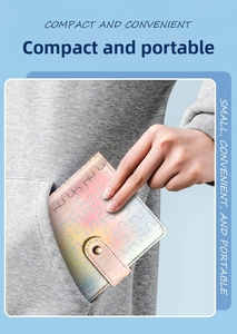 Compact puzzle pattern A7 notebook being placed into a pocket for easy portability