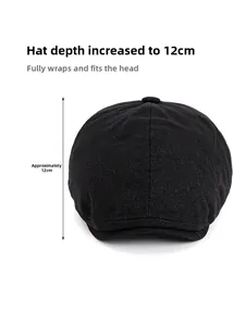 Detail view of the black newsboy cap featuring 12cm deep crown and twill fabric texture