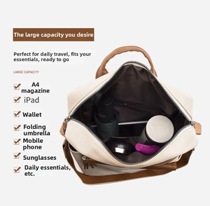 Detailed view of spacious backpack interior holding a water bottle, umbrella and tablet