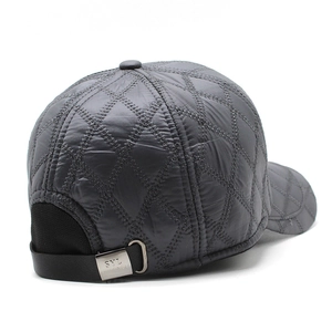 Detail of grey quilted baseball cap with adjustable metal buckle and SYL branding