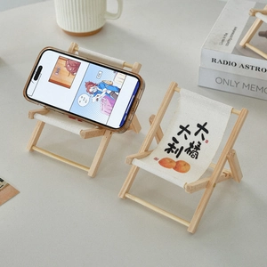 Mini wooden deck chair phone stands with off-white canvas and cute orange graphic prints