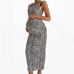 Detailed view of the leopard print maternity maxi dress showing the sleeveless cut and texture