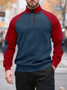Detail of navy and burgundy colorblock knit sweater with button collar and elbow patches