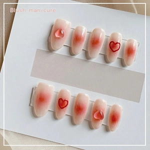 Blush gradient pink oval press-on nails with 3D resin heart charms and 10 pieces set