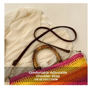Detail of woven straw bag with bamboo handle and pink to yellow gradient finish