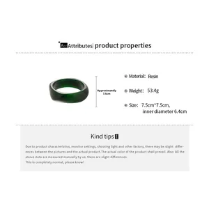 Detail view of green resin bracelet with 6.4cm inner diameter and marble texture