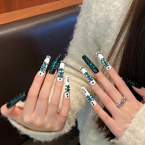 Extra long emerald green and white handmade press-on nails with sparkling rhinestones