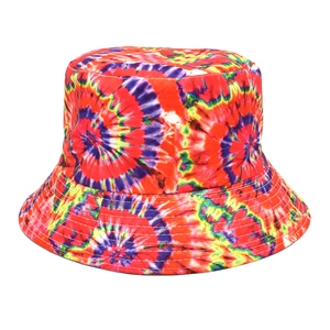 Detailed macro view of the vibrant rainbow tie-dye pattern on cotton bucket hat