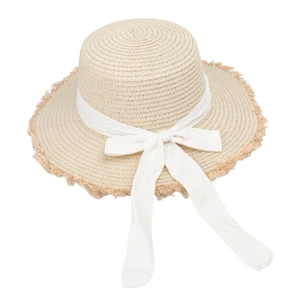 Women's beige straw sun hat with large bow and frayed wide brim for summer beach