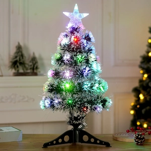 Colorful fiber optic Christmas tree with glowing star topper and black base