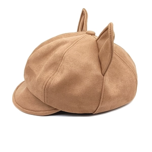 Close-up of brown suede newsboy cap featuring 3D cat ears and soft autumn fabric