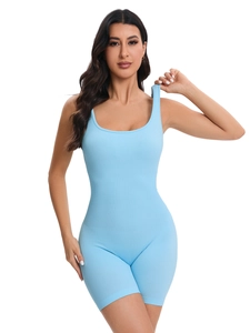 Close-up of seamless light blue ribbed yoga romper fabric and textured stitching detail