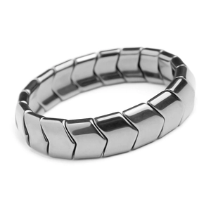 Hematite energy bracelet with arrow-shaped geometric links and gunmetal finish on white back