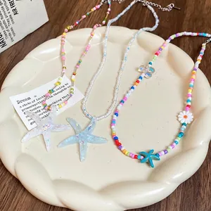 Colorful starfish beaded necklace with daisy accents for a summer beach vacation style