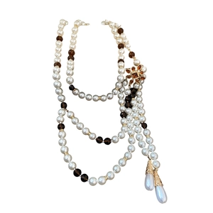 Vintage layered pearl necklace with gold flower accents and water drop pendants