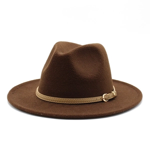 Detail of dark brown wool jazz hat with a light tan leather belt and gold metal buckle