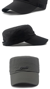 Detail view of sports embroidery and fabric texture on men's flat top sun caps