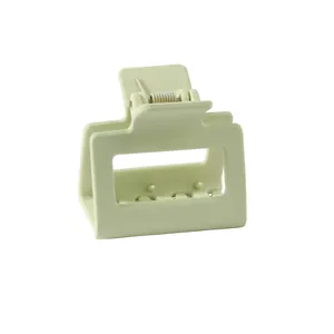 Detail of mint green matte 5cm square hair claw clip with anti-slip teeth and metal spring