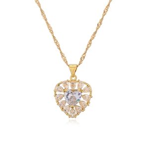 Luxurious gold-plated heart pendant necklace with shimmering zircon stones on white background
