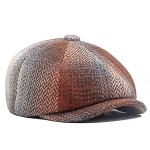 Classic herringbone newsboy cap in orange and grey tweed wool for men and women