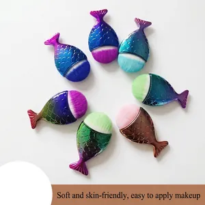 7-piece mermaid tail makeup brush set with scale texture and colorful gradient handles