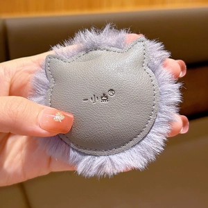 Cute gray plush cat ears leather keychain held in hand for size display