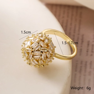 Detailed view of a 1.5cm sphere ring with baguette-cut zircons in 18K gold plating