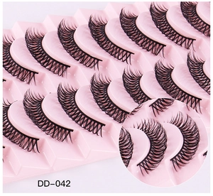 Detail of DD-042 black false eyelashes showing dense volume and Russian curl texture