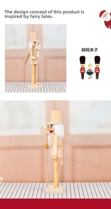 Close-up of unfinished wooden nutcracker puppet with a moving lever and white hair detail