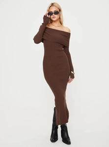 Detail view of the sleek off-shoulder neckline and ribbed knit texture on the brown dress