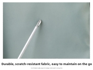 Close-up of scratch-resistant cross-texture fabric being tested with a screwdriver