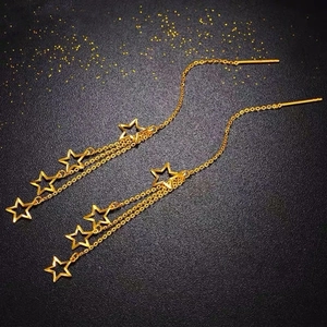 Long gold tassel star earrings in titanium steel with 18K gold plating and starry design