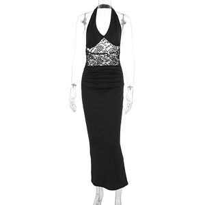 Detail of waist white floral lace patchwork and ruched design on black bodycon dress