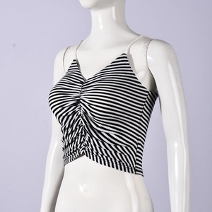Detail of a black and white striped knit crop top with ruched front and thin straps