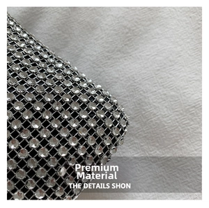 Detailed close-up of sparkling rhinestone mesh fabric and premium inner lining