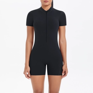 Close-up of black tight fitness romper with high-stretch fabric and half-zip collar