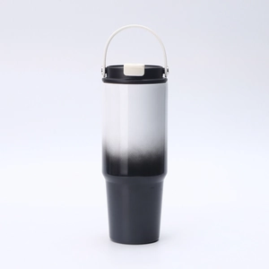 Detail view of 30oz insulated tumbler with black-and-white gradient and sturdy handle
