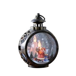 Vintage bronze Christmas lantern with Santa scene and warm LED flickering candle light