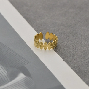 Detailed view of the golden laurel leaf adjustable open ring with intricate leaf textures