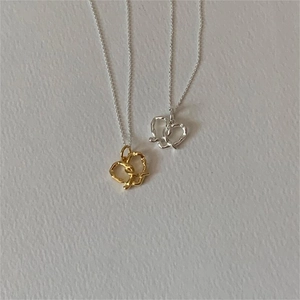 Minimalist 925 sterling silver heart necklaces with textured pendants in gold and silver