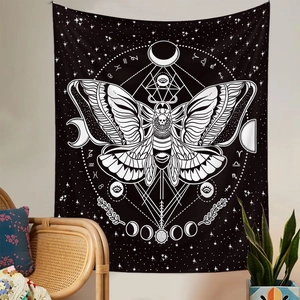 Detail of bohemian moth tapestry with moon phases and zodiac signs for wall decoration