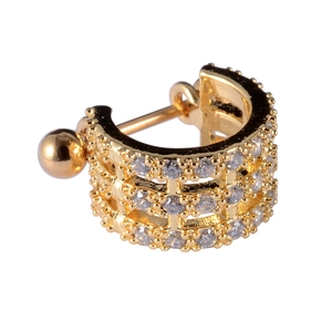 Detailed view of golden triple layer hoop earring with sparkling cubic zirconia stones