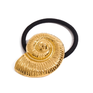Golden nautilus shell hair tie with black elastic band for a stylish ponytail accessory