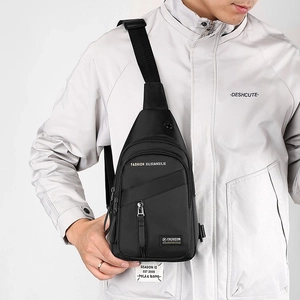 Men's minimalist black chest bag with multiple zipper pockets for casual outdoor commuting