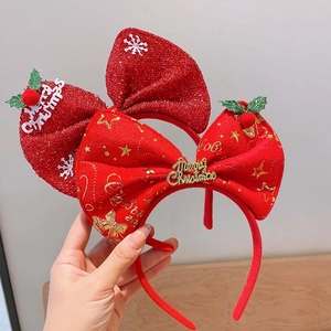 Red Christmas reindeer headband with Merry Christmas bow and glitter stars